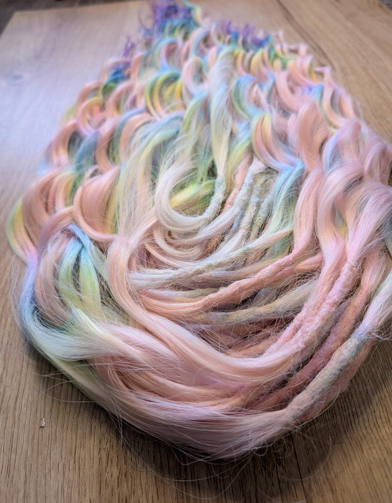 Rainbow & Pastel Pink Dreadlock Extensions – Brushable DE Synthetic Dreads 22–24”