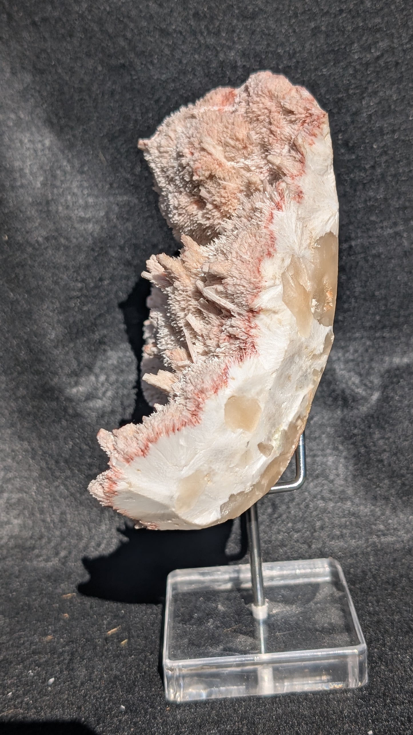 Side view of pink mordenite crystal specimen 